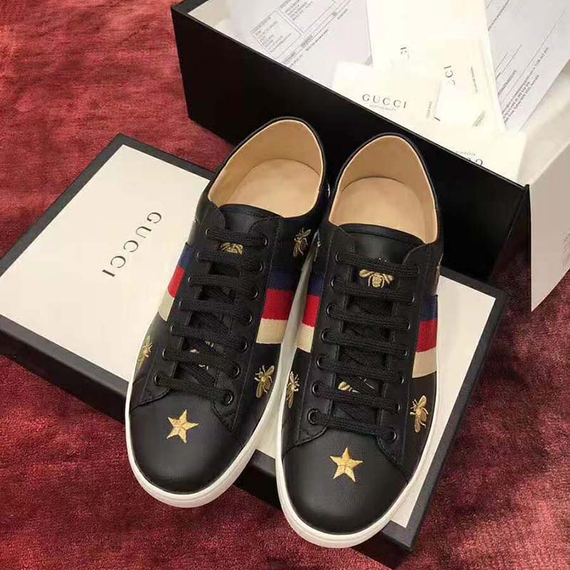 G*u*i men’s ace embroidered sneaker in black leather with bees and stars