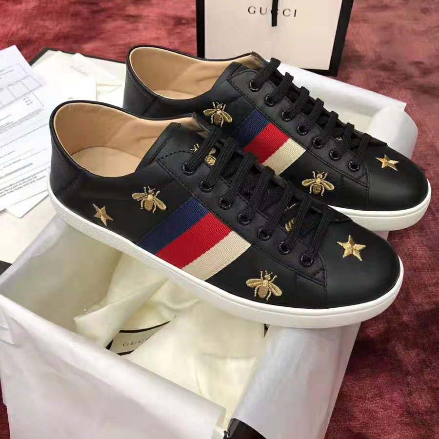 G*u*i men’s ace embroidered sneaker in black leather with bees and stars