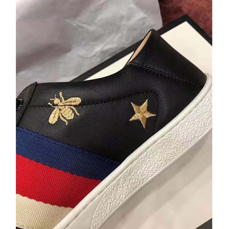 G*u*i men’s ace embroidered sneaker in black leather with bees and stars