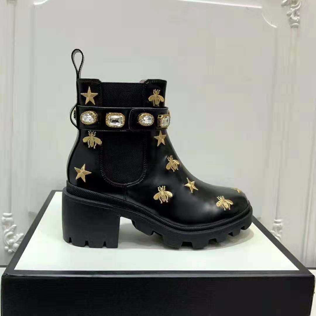G*u*i women G*u*i embroidered leather ankle boot with belt in black leather 6 cm heel