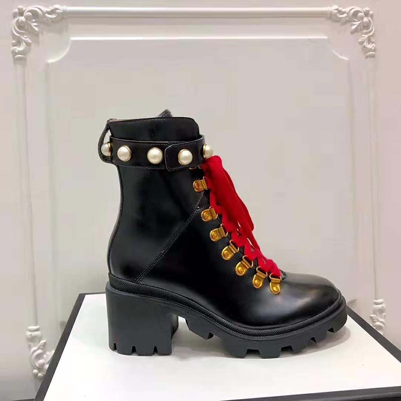 G*u*i women G*u*i leather ankle boot in black shiny leather 7.6 cm