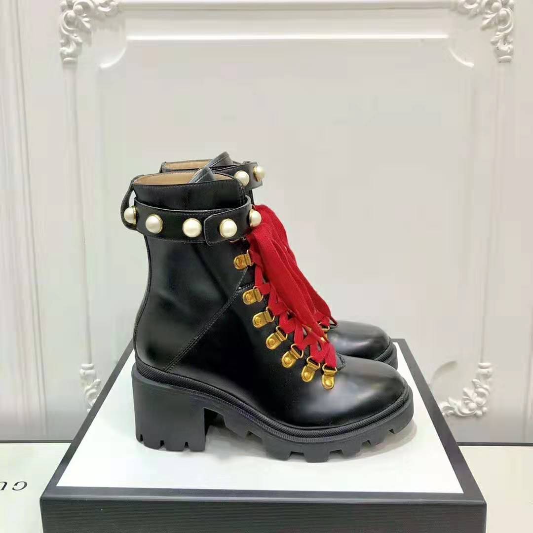 G*u*i women G*u*i leather ankle boot in black shiny leather 7.6 cm