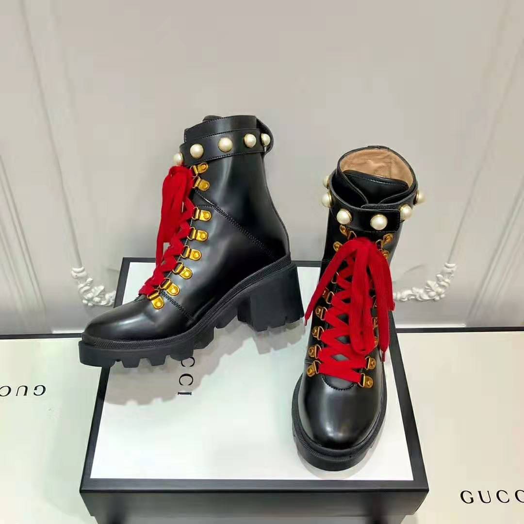 G*u*i women G*u*i leather ankle boot in black shiny leather 7.6 cm