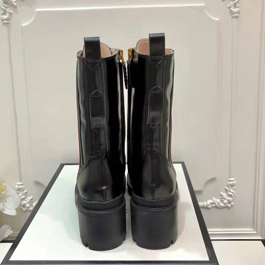 G*u*i women G*u*i leather ankle boot with web in black shiny leather 4.8 cm heel