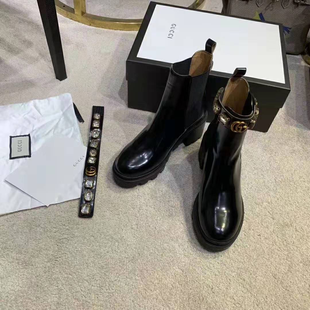 G*u*i women leather ankle boot with belt 6 cm heel in black shiny leather
