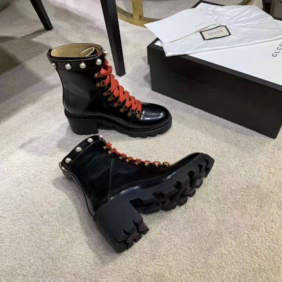 G*u*i women leather ankle boot with red laces in black shiny leather