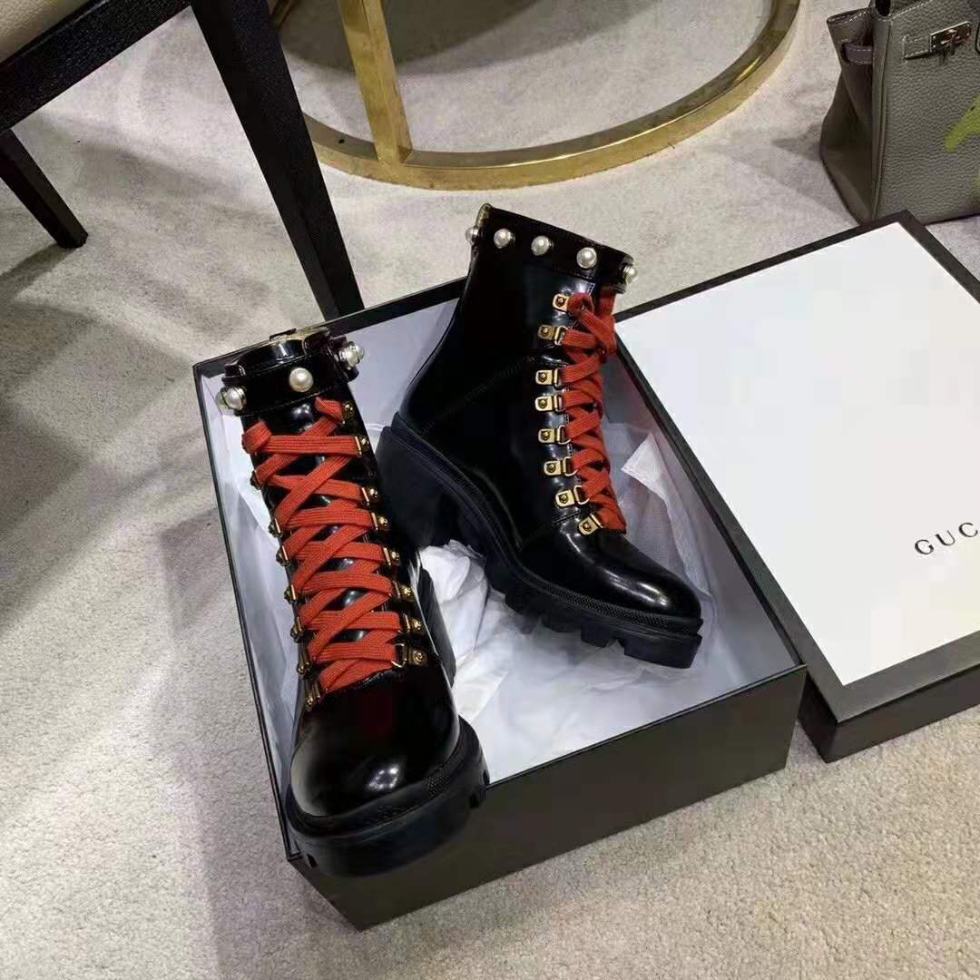 G*u*i women leather ankle boot with red laces in black shiny leather