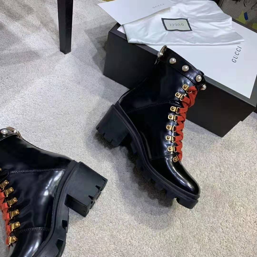 G*u*i women leather ankle boot with red laces in black shiny leather