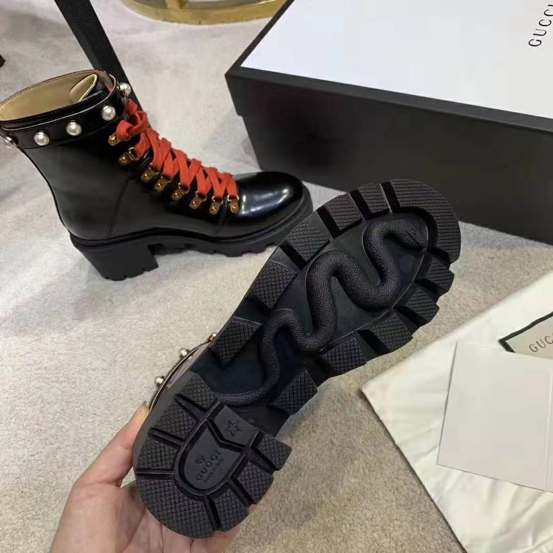 G*u*i women leather ankle boot with red laces in black shiny leather
