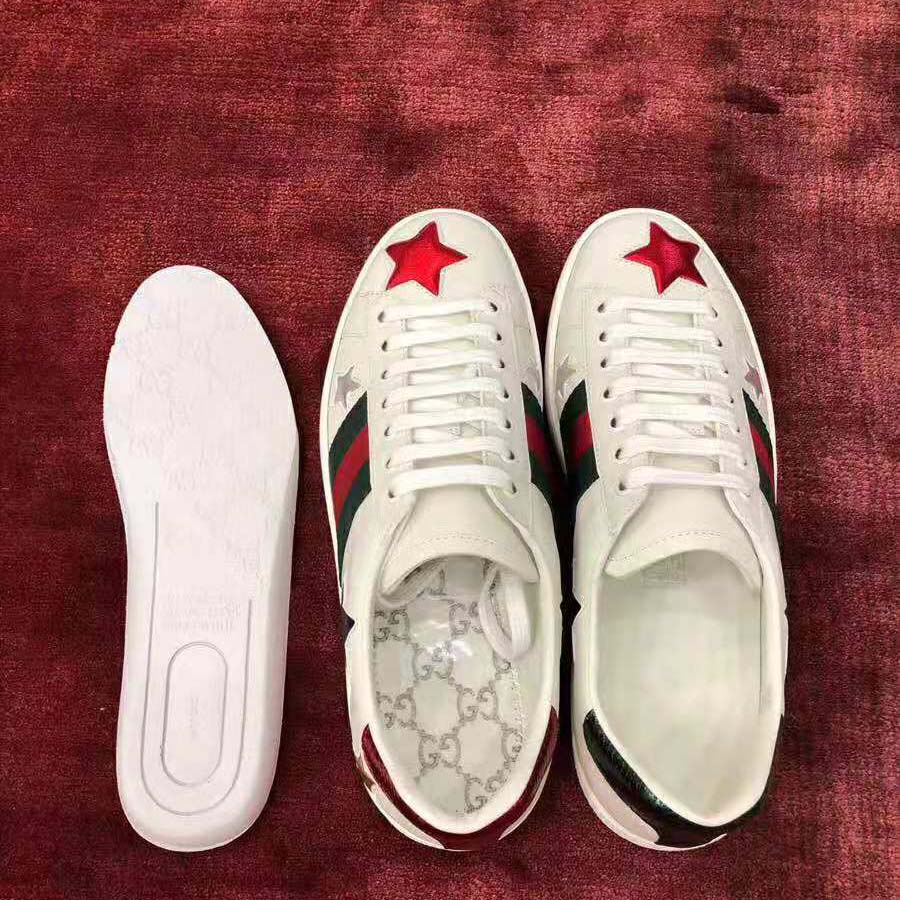 G*u*i women’s ace embroidered sneaker in white leather with inlaid multicolor stars