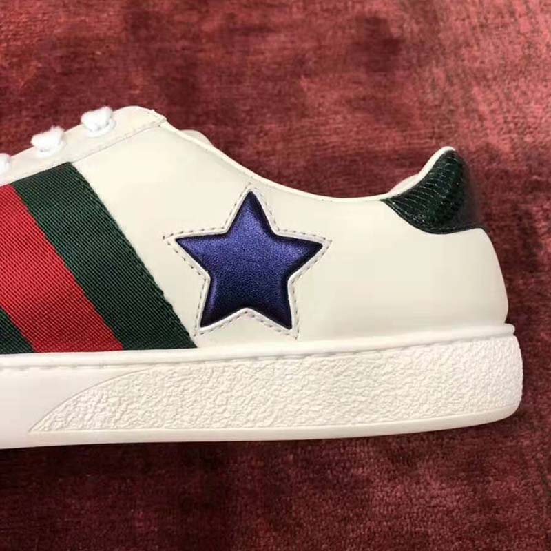 G*u*i women’s ace embroidered sneaker in white leather with inlaid multicolor stars