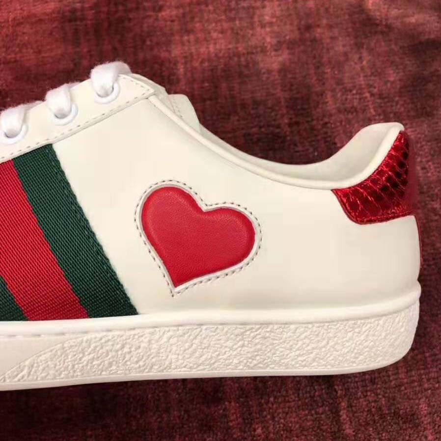 g*u*i women’s ace embroidered sneaker with two leather He**ts in rubber sole-white