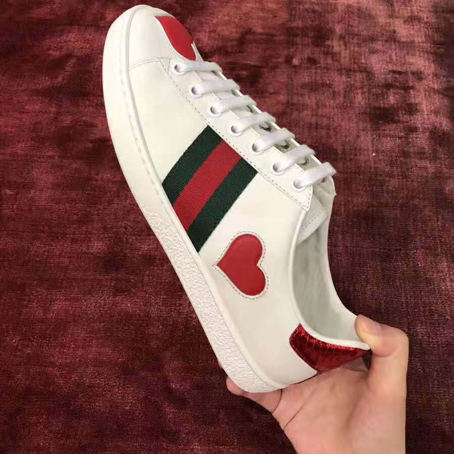 g*u*i women’s ace embroidered sneaker with two leather He**ts in rubber sole-white