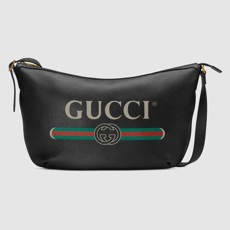 G*u*i gg unisex G*u*i print half-moon hobo bag in leather with G*u*i vintage logo