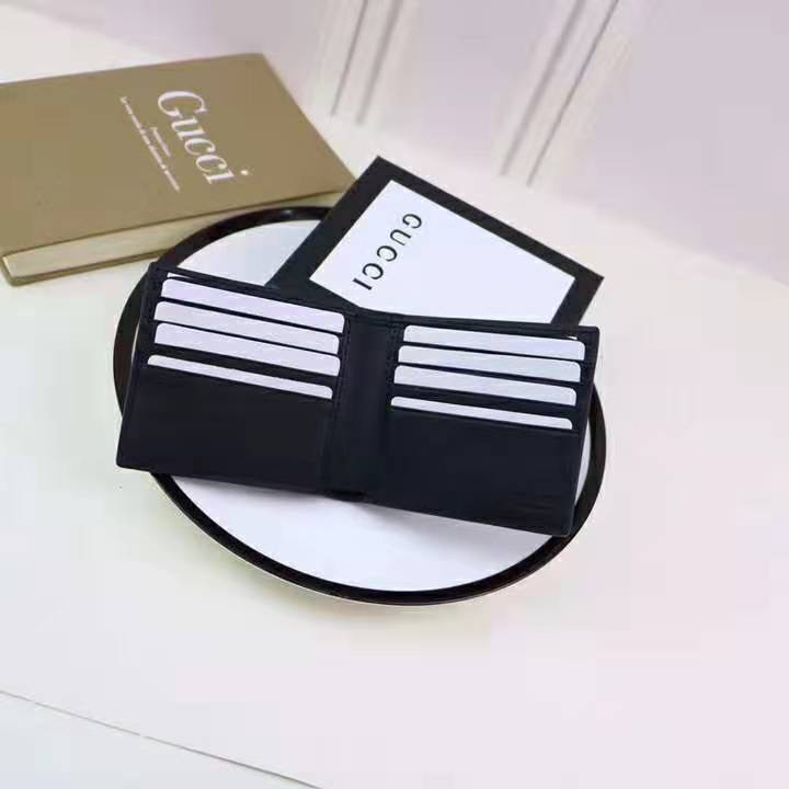 G*u*i gg men G*u*i signature bi-fold wallet in black leather
