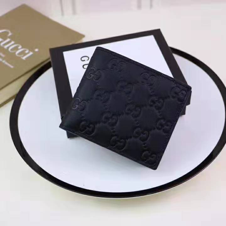 G*u*i gg men G*u*i signature bi-fold wallet in black leather