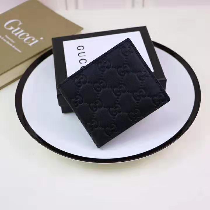 G*u*i gg men G*u*i signature bi-fold wallet in black leather