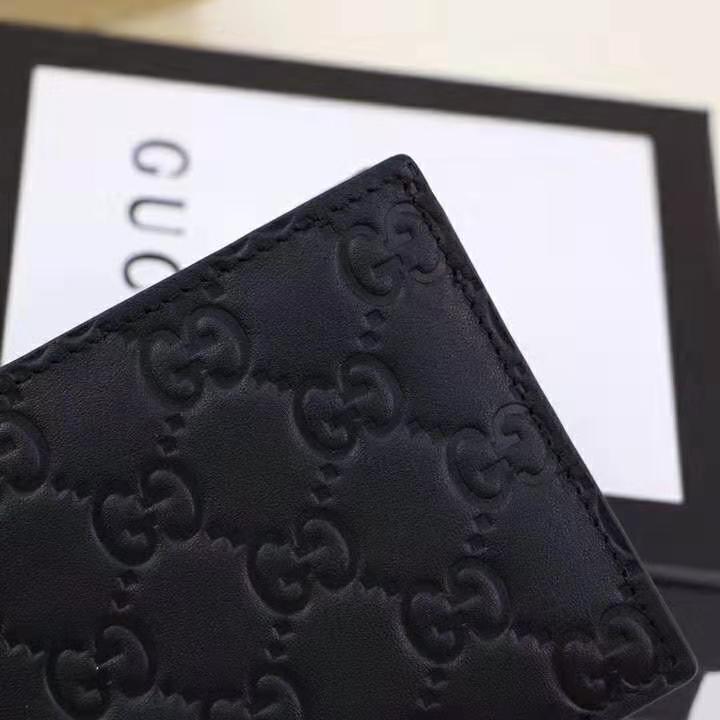 G*u*i gg men G*u*i signature bi-fold wallet in black leather