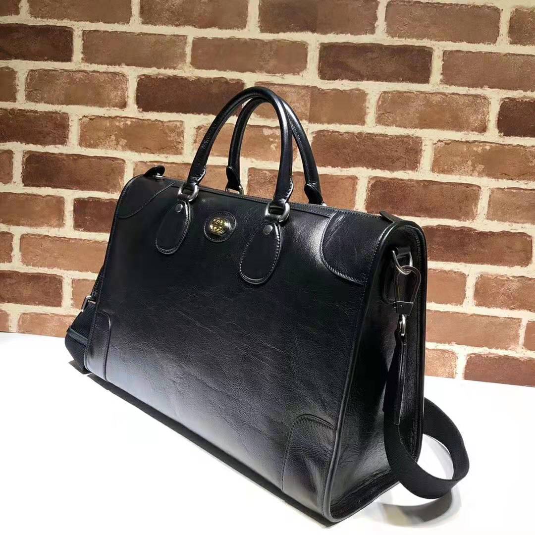 G*u*i gg men medium soft leather duffle in black soft leather
