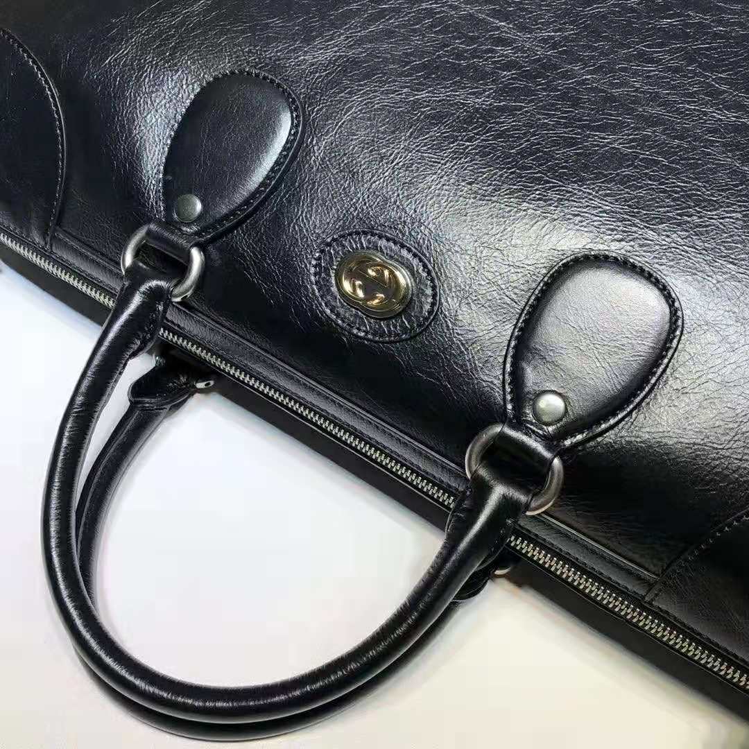G*u*i gg men medium soft leather duffle in black soft leather