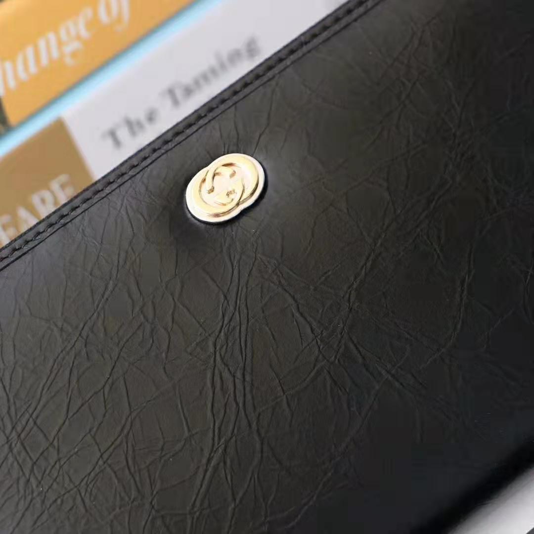 G*u*i gg men zip around wallet with interlocking g in black soft leather