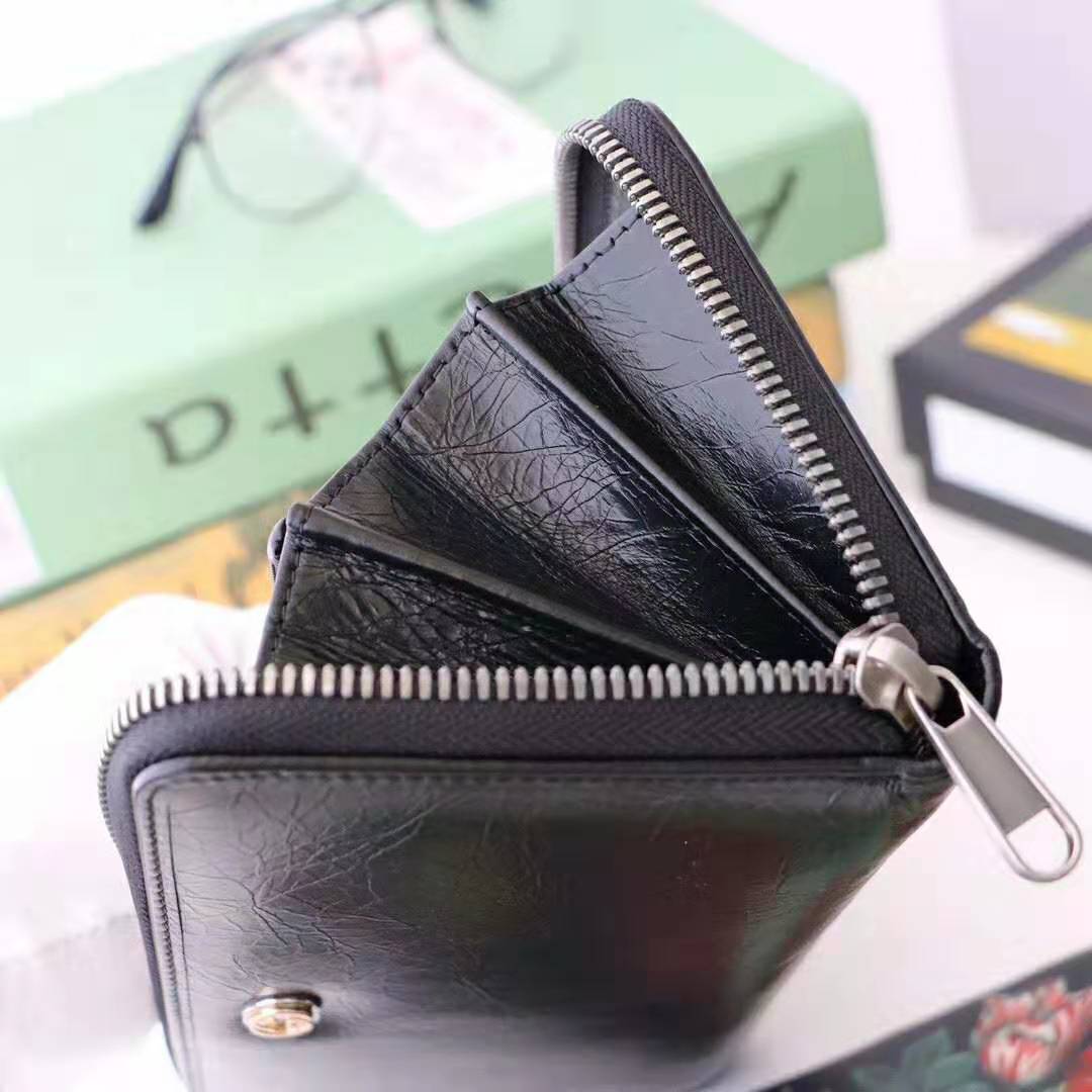 G*u*i gg men zip around wallet with interlocking g in black soft leather