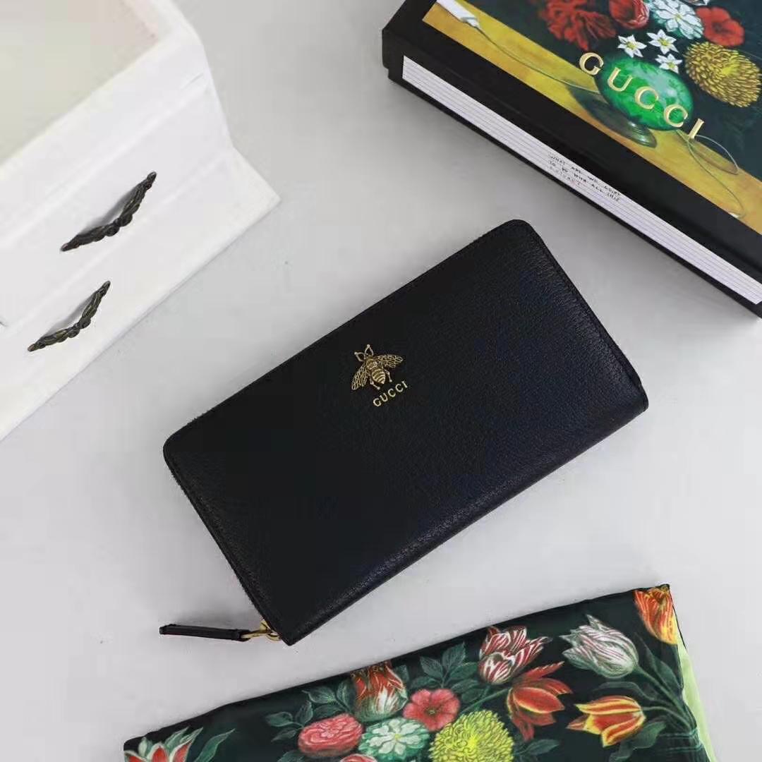 G*u*i gg unisex animalier leather zip around wallet in black leather