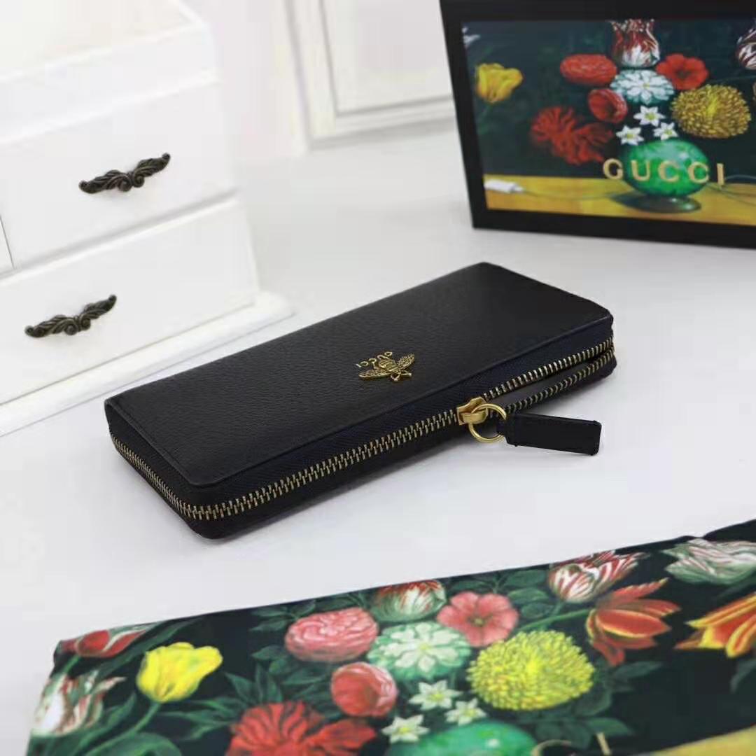 G*u*i gg unisex animalier leather zip around wallet in black leather