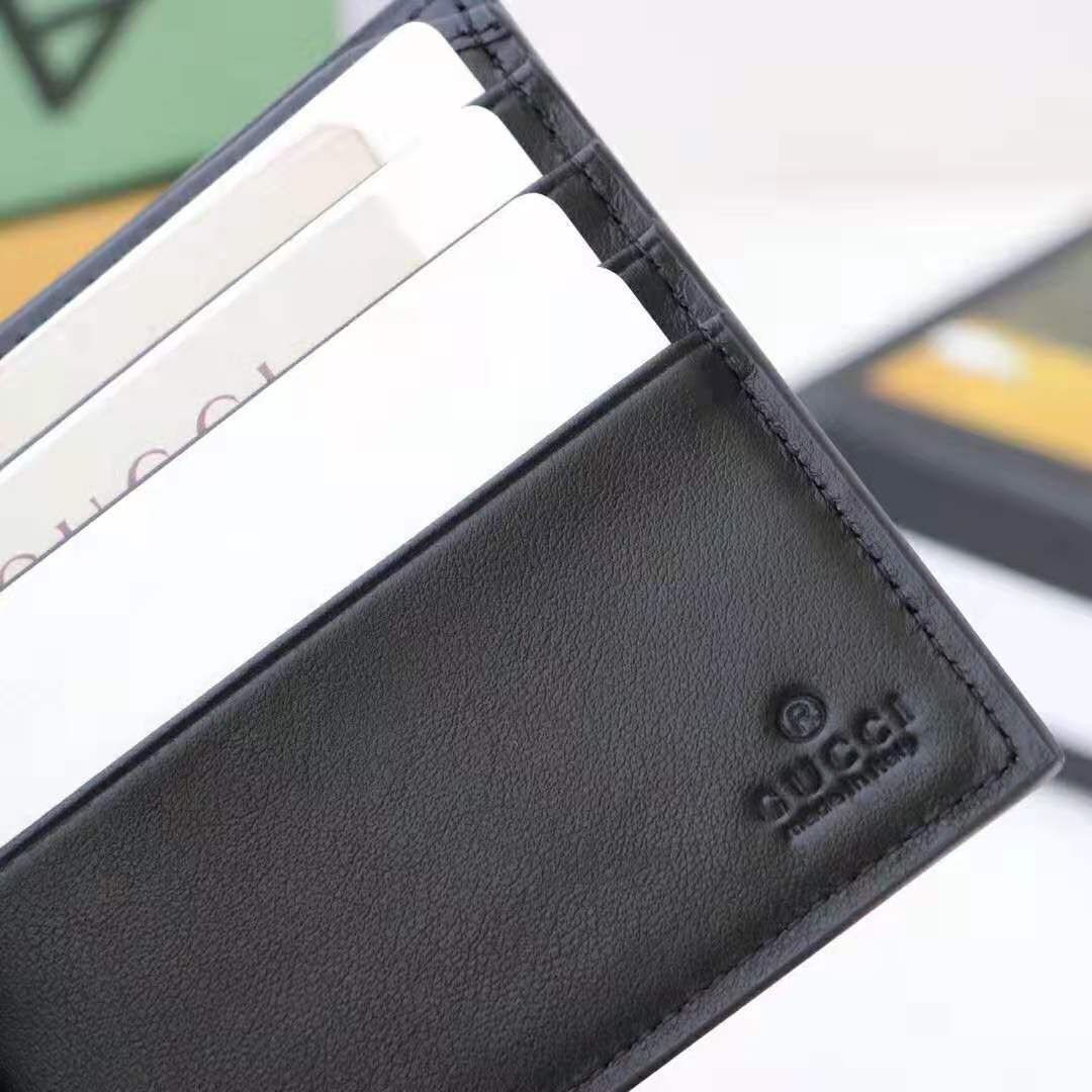 G*u*i gg unisex leather wallet with G*u*i logo in black leather