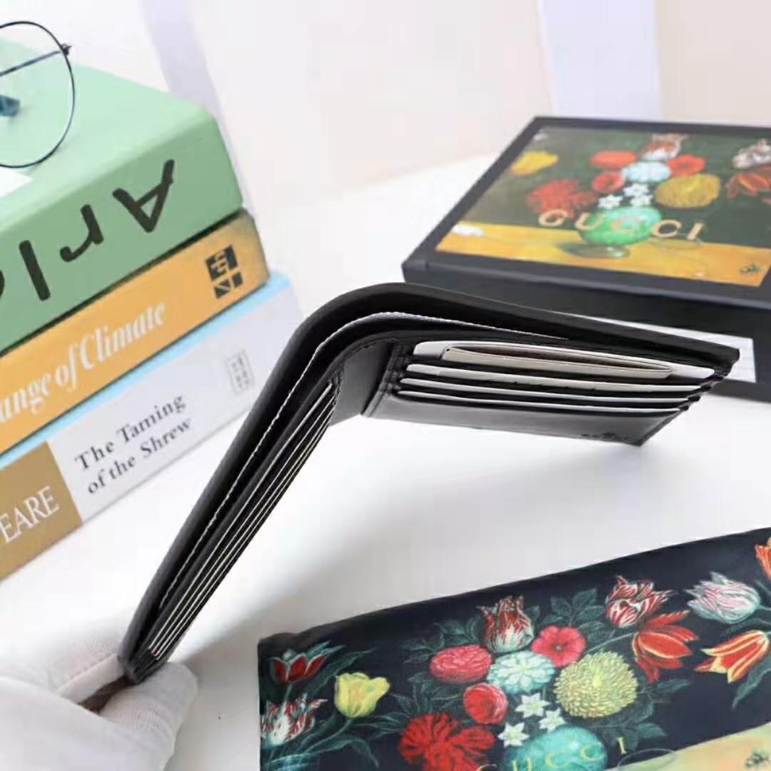 G*u*i gg unisex leather wallet with G*u*i logo in black leather