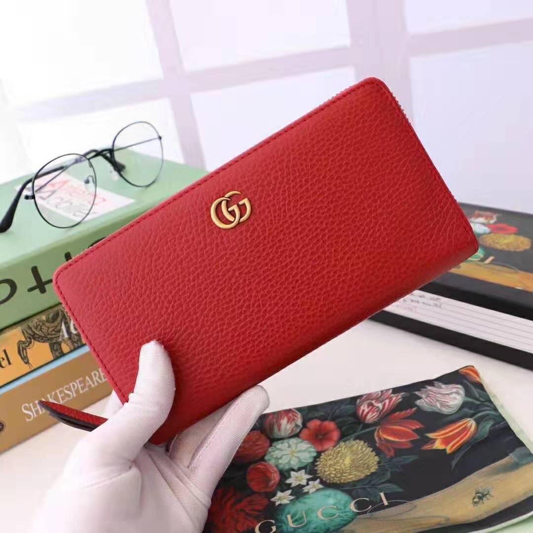 G*u*i gg unisex leather zip around wallet in hibiscus red leather