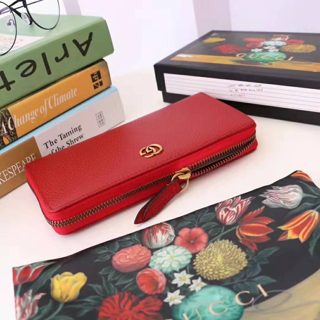 G*u*i gg unisex leather zip around wallet in hibiscus red leather