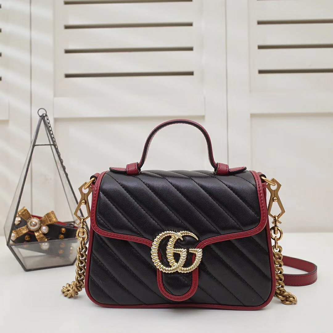 G*u*i gg women gg marmont mini top handle bag in black diagonal matelassé leather