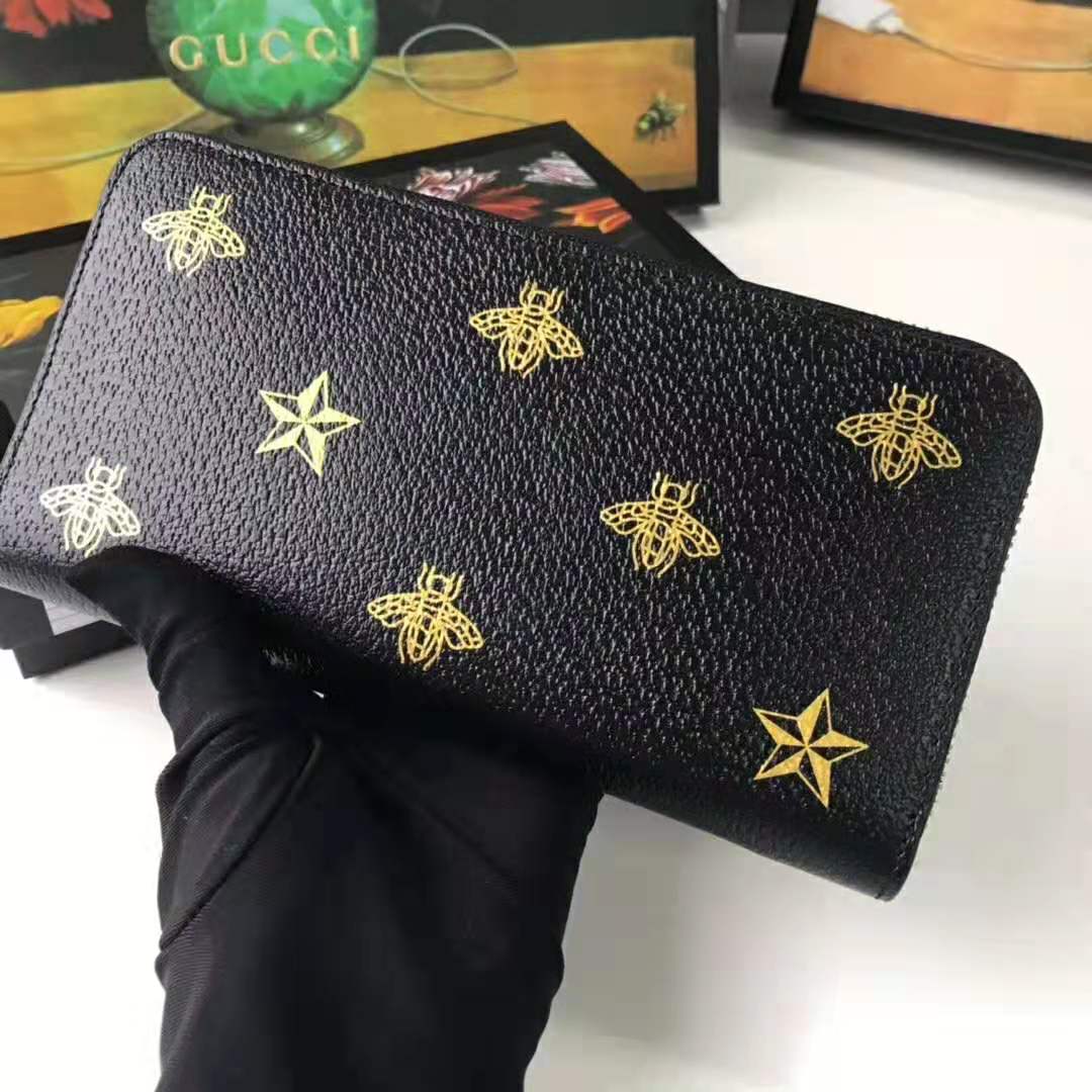 G*u*i gg unisex bee star leather zip around wallet in black metal-free tanned leather