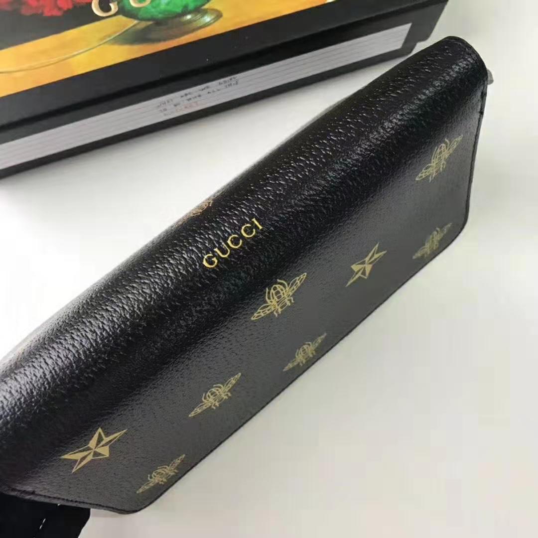 G*u*i gg unisex bee star leather zip around wallet in black metal-free tanned leather