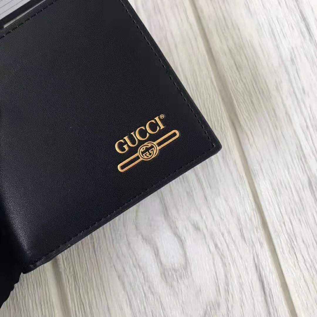 G*u*i gg unisex leather mini wallet with G*u*i logo in black leather