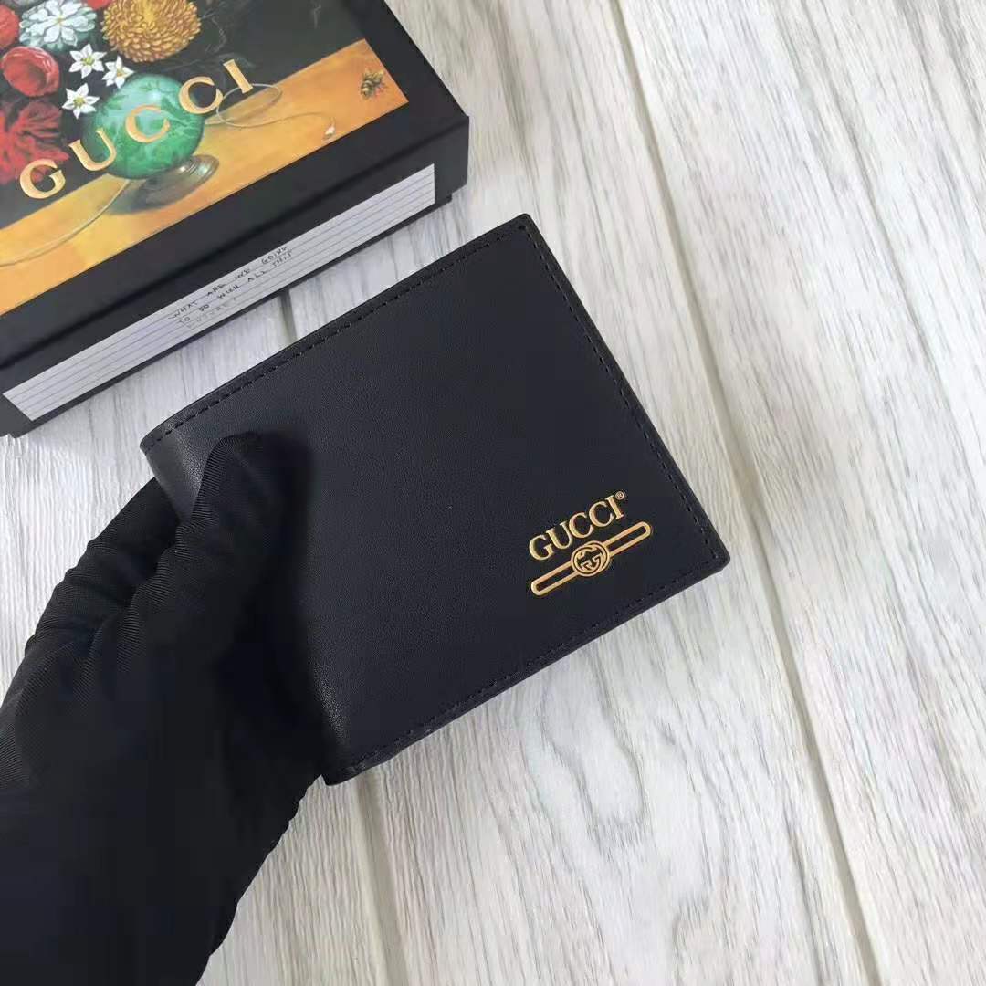 G*u*i gg unisex leather mini wallet with G*u*i logo in black leather
