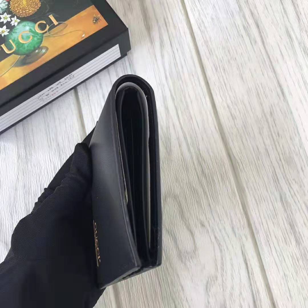 G*u*i gg unisex leather mini wallet with G*u*i logo in black leather