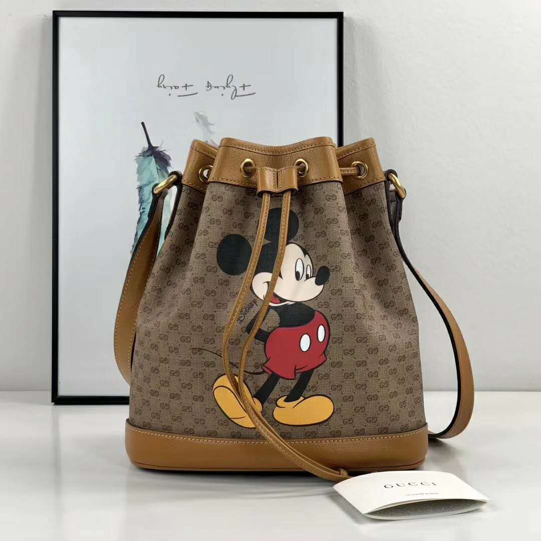 G*u*i gg unisex disney x G*u*i small bucket bag gg supreme canvas