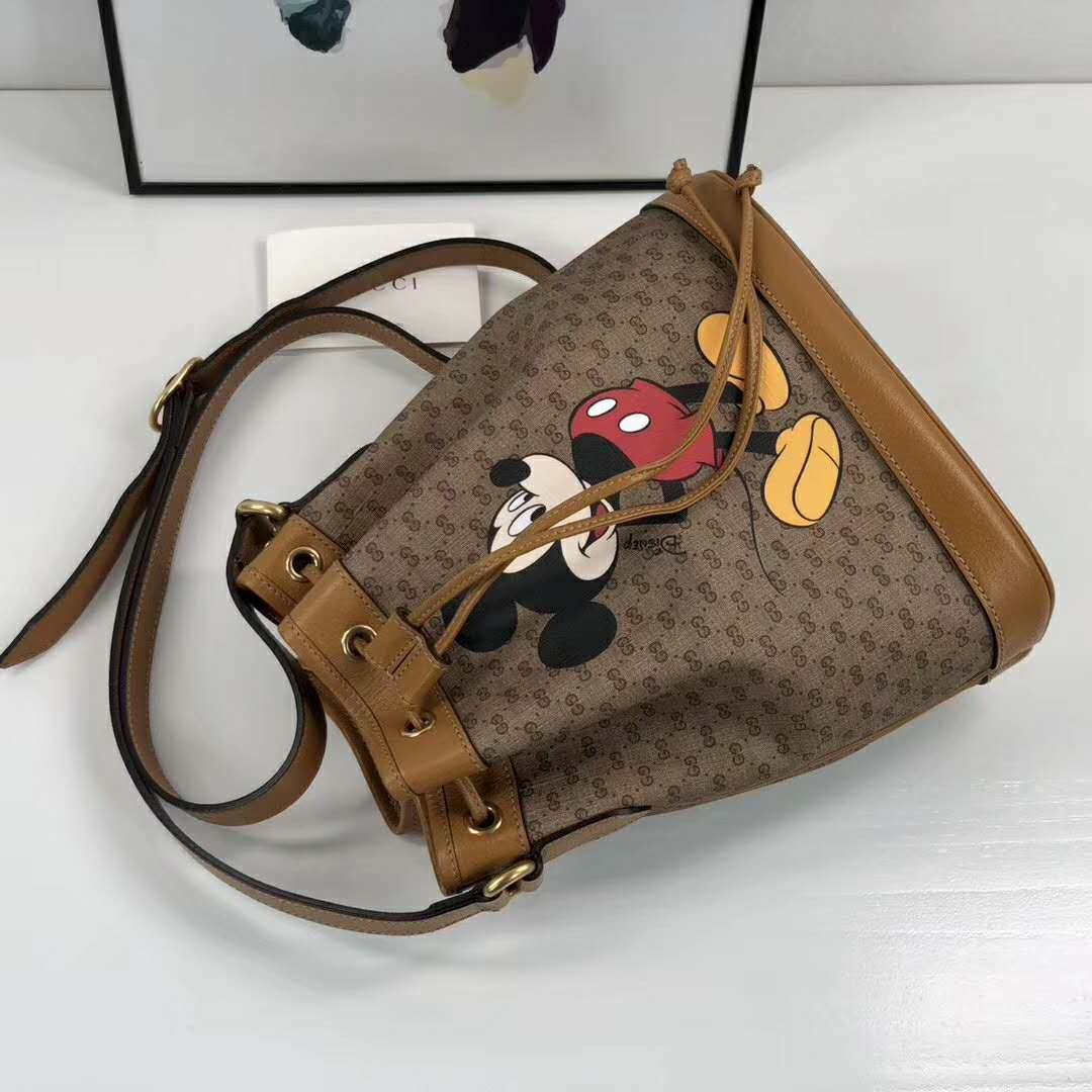 G*u*i gg unisex disney x G*u*i small bucket bag gg supreme canvas