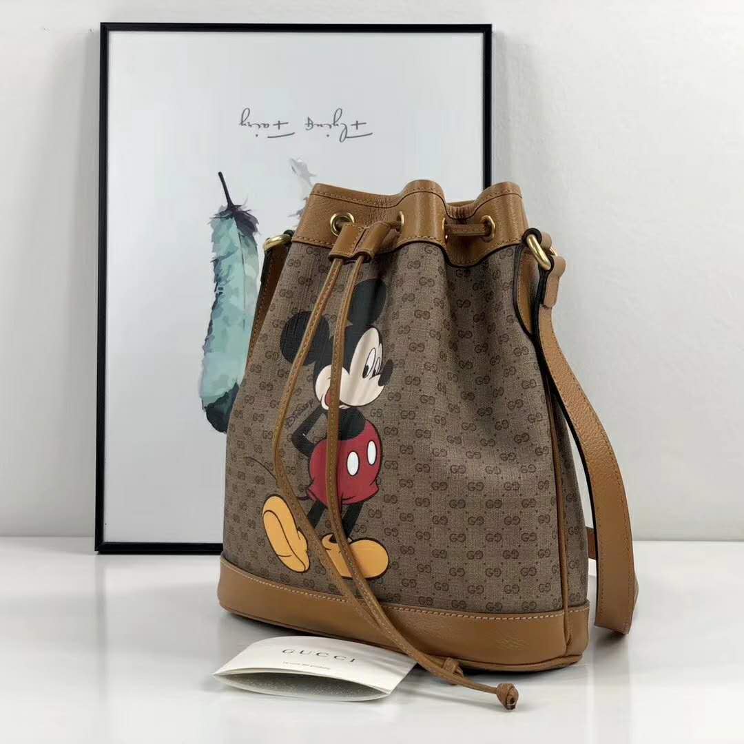 G*u*i gg unisex disney x G*u*i small bucket bag gg supreme canvas