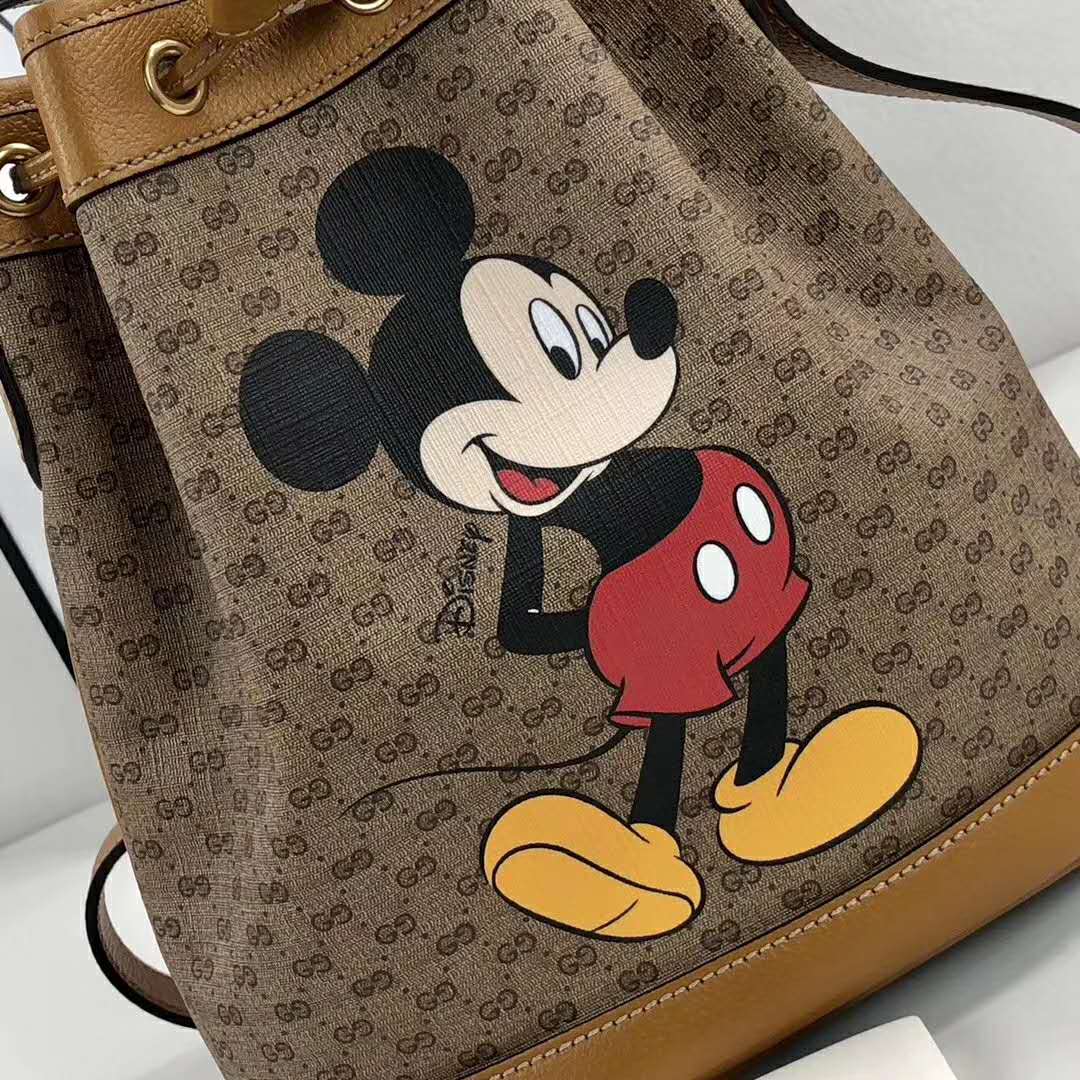 G*u*i gg unisex disney x G*u*i small bucket bag gg supreme canvas