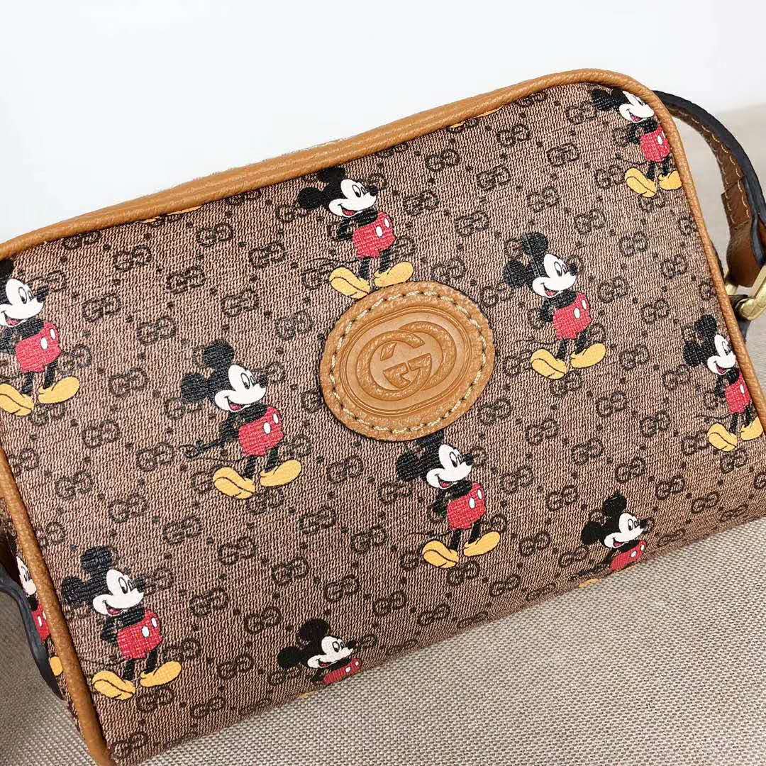 G*u*i gg women disney x G*u*i shoulder bag gg supreme canvas