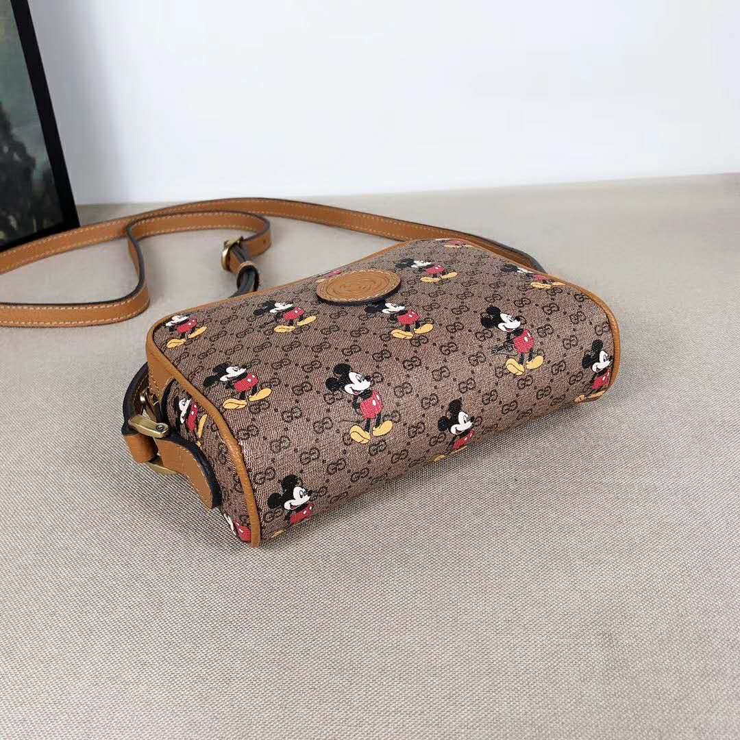 G*u*i gg women disney x G*u*i shoulder bag gg supreme canvas