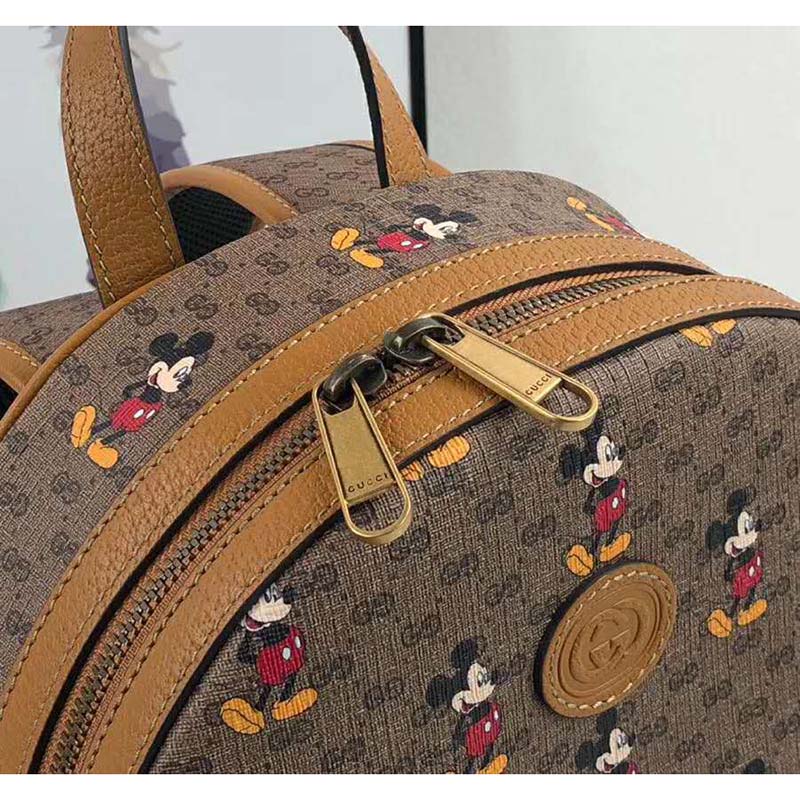 G*u*i gg women disney x G*u*i small backpack gg supreme canvas