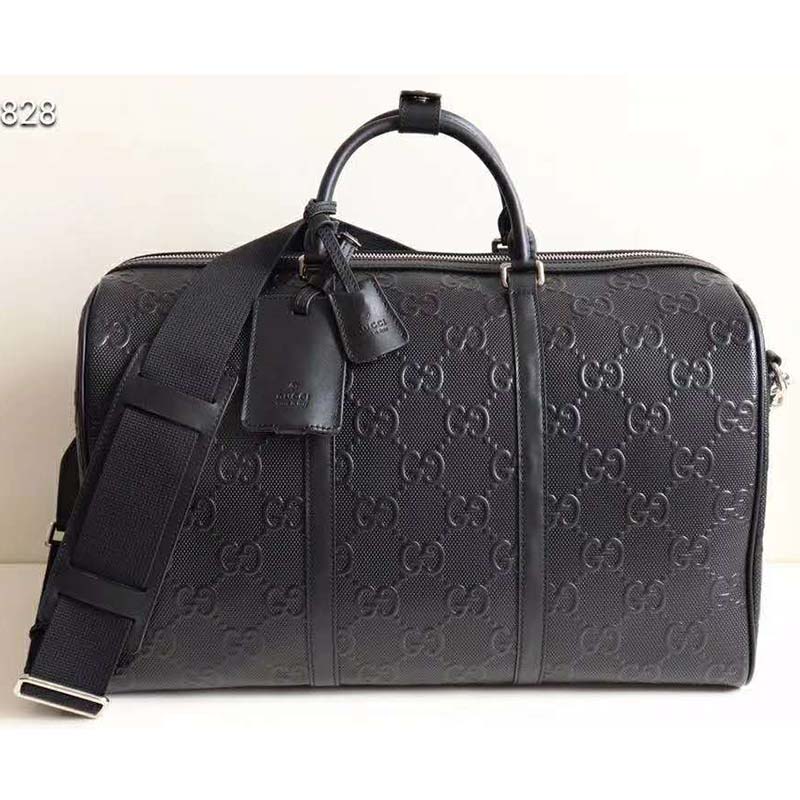 G*u*i gg unisex gg embossed duffle bag black embossed leather