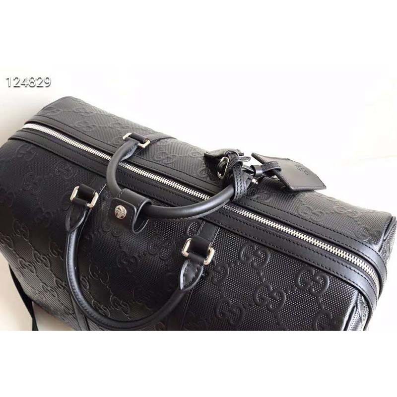 G*u*i gg unisex gg embossed duffle bag black embossed leather