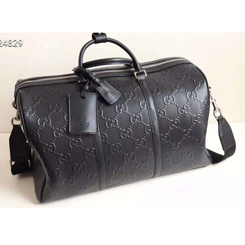 G*u*i gg unisex gg embossed duffle bag black embossed leather