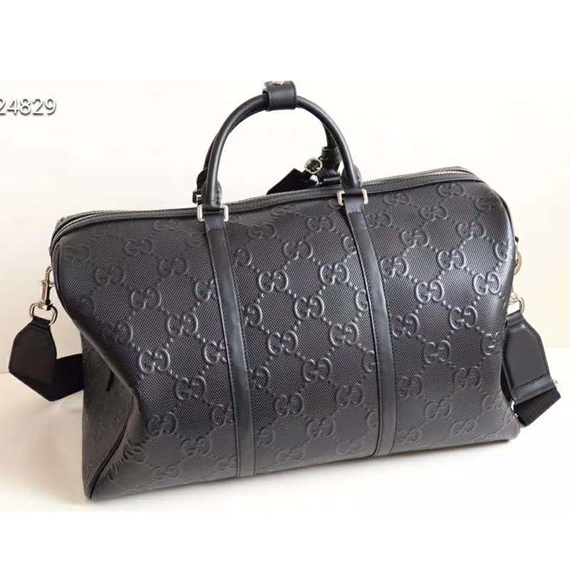 G*u*i gg unisex gg embossed duffle bag black embossed leather