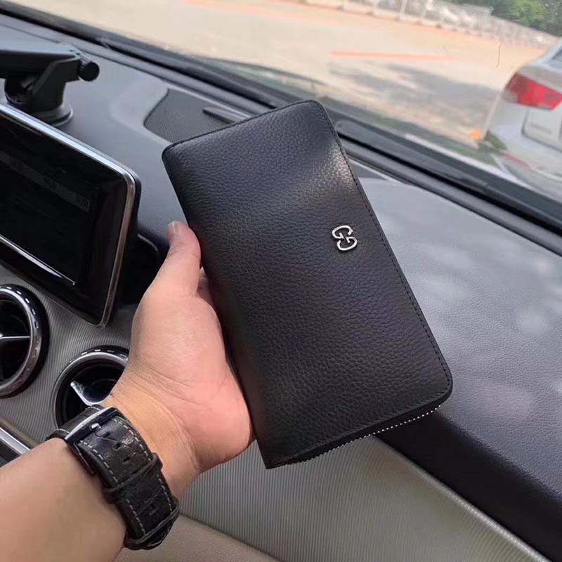 G*u*i gg unisex leather zip around wallet black metal gg
